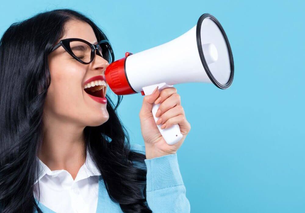 woman yelling in megaphone